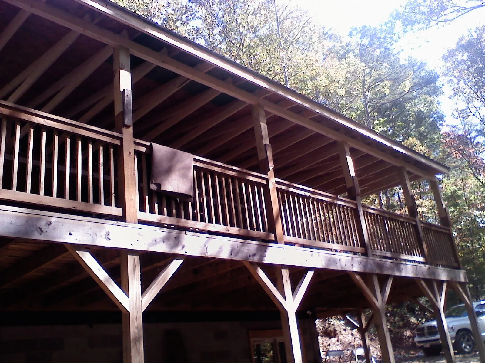 Timber framing under a new elevated porch and deck — Roof Leak Repair in Hyde Park by Roofing Brothers